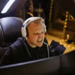 Google's GameNGen AI recreates "Doom" with stunning accuracy 3 Man playing a game | Photo by RDNE Stock project