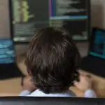 The Best 5 Sandboxing Environment Solutions of 2025 2 close up programmer sitting desk